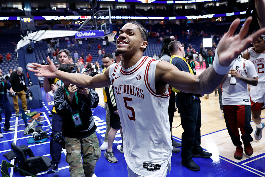 NASHVILLE, TN - MARCH 14: Arkansas Razorbacks guard Darius Acuff Jr. (5) holds his hands out an cheers to fans as he walks off the floor following a 93-90 win in a semifinal game of the SEC Tournament between the Mississippi Rebels and Arkansas Razorbacks, March 14, 2026 at Bridgestone Arena in Nashville, Tennessee. (Photo by Matthew Maxey/Icon Sportswire via Getty Images)