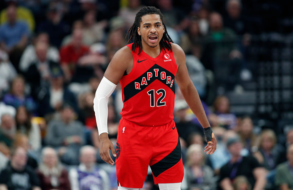 SALT LAKE CITY, UT - MARCH 23: Collin Murray-Boyles #12 of the Toronto Raptors calls a defensive play during the second half of their game against the Utah Jazz at the Delta Center on March 23, 2026 in Salt Lake City, Utah.NOTE TO USER: User expressly acknowledges and agrees that, by downloading and or using this photograph, User is consenting to the terms and conditions of the Getty Images License Agreement. (Photo by Chris Gardner/Getty Images)