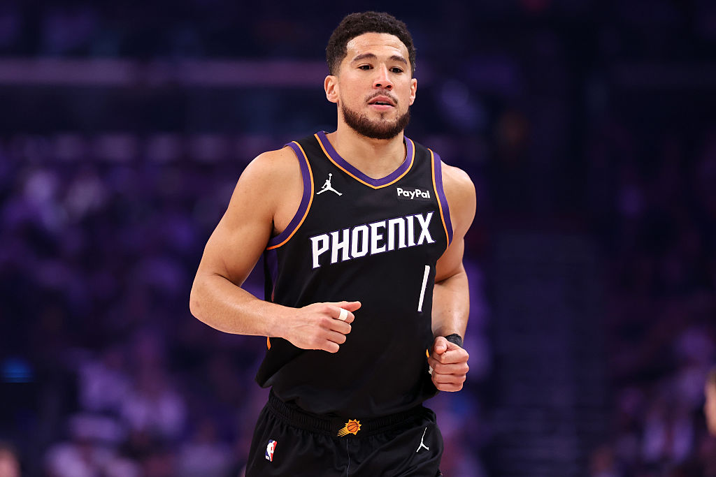 PHOENIX, ARIZONA - MARCH 21: Devin Booker #1 of the Phoenix Suns during the first half against the Milwaukee Bucks at Mortgage Matchup Center on March 21, 2026 in Phoenix, Arizona. The Bucks defeated the Suns 108-105. NOTE TO USER: User expressly acknowledges and agrees that, by downloading and or using this photograph, User is consenting to the terms and conditions of the Getty Images License Agreement. (Photo by Chris Coduto/Getty Images)