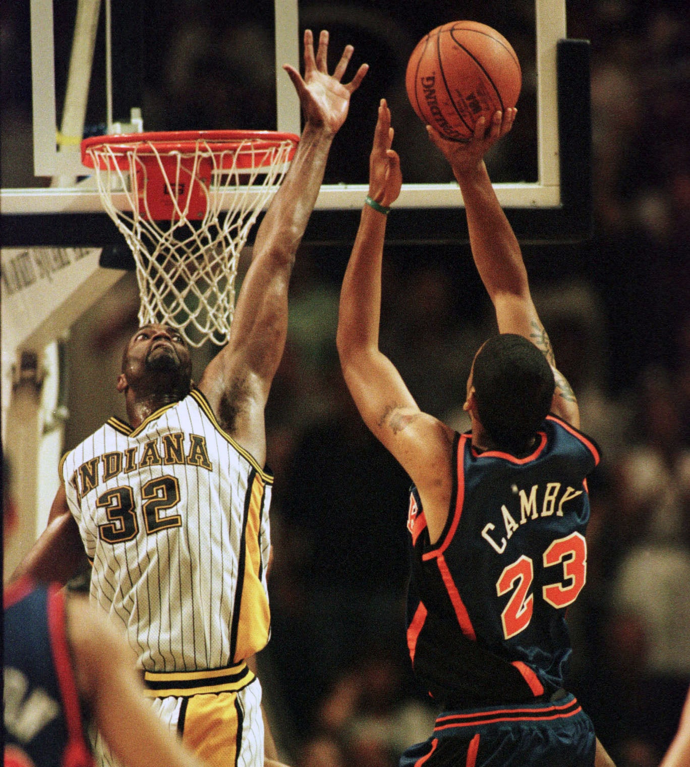 9 Jun 1999: Marcus Camby #23 of the New York Knicks puts up a shot against Dale Davis #32 of the Indiana Pacers during Game 5 of the NBA Eastern Conference Finals at Market Square Arena in Indianapolis, Indiana. (Matthew Stockman/ALLSPORT)