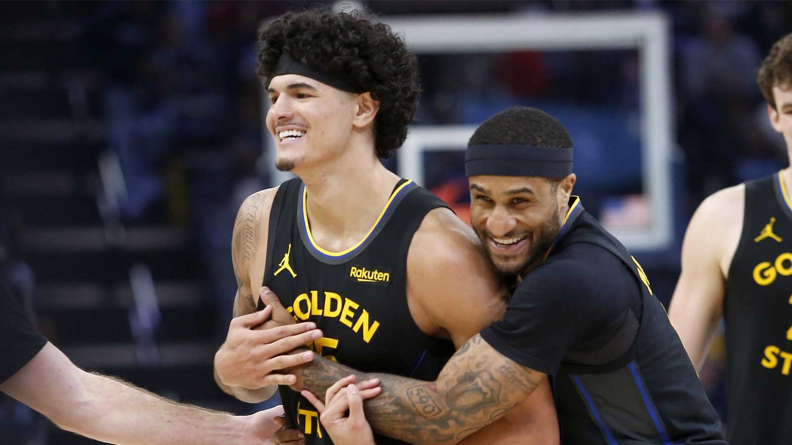 Golden State Warriors guard Gary Payton II (0) embraces with forward Gui Santos (15) during the second half against the Memphis Grizzlies at FedExForum.