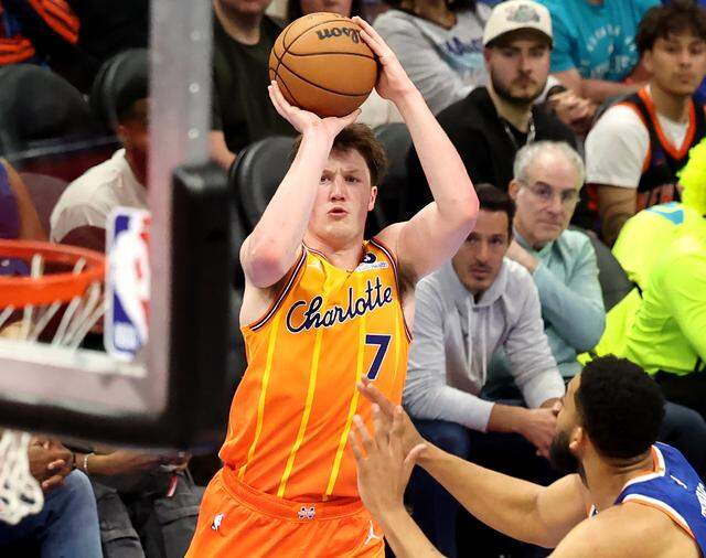 Charlotte Hornets forward Kon Knueppel releases a three-point shot during action against the New York Knicks at Spectrum Center in Charlotte, NC on Thursday, March 26, 2026. The Hornets defeated the Knicks 114-103.
