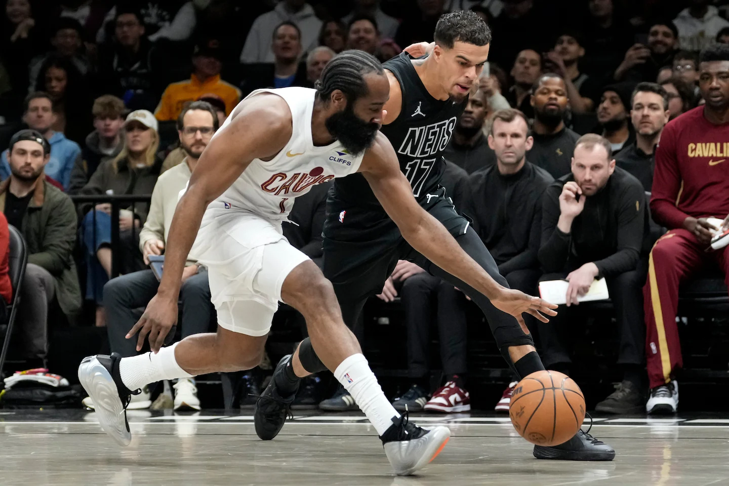 Harden scores 22 points with broken thumb, leads Cavaliers over the Nets 106-102