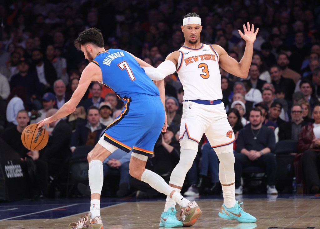 Josh Hart defends against Chet Holmgren during the Knicks' 103-100 loss to the Thunder at the Garden on March 4, 2026.