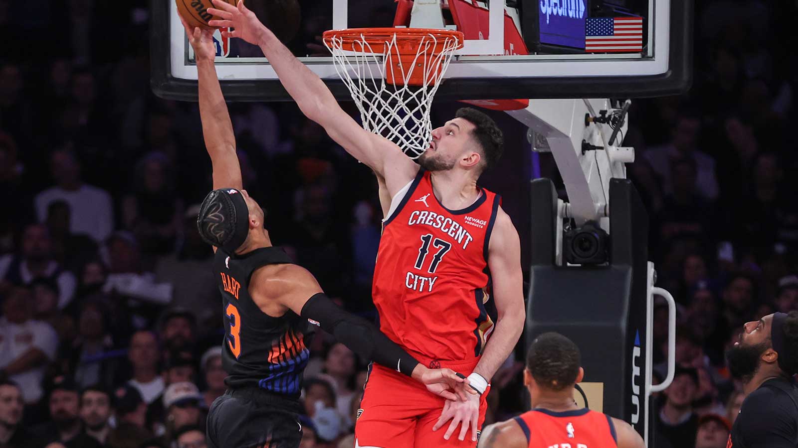 New Orleans Pelicans forward Karlo Matkovic (17) attempts to block a shot taken by New York Knicks guard Josh Hart (3) in the third quarter at Madison Square Garden.