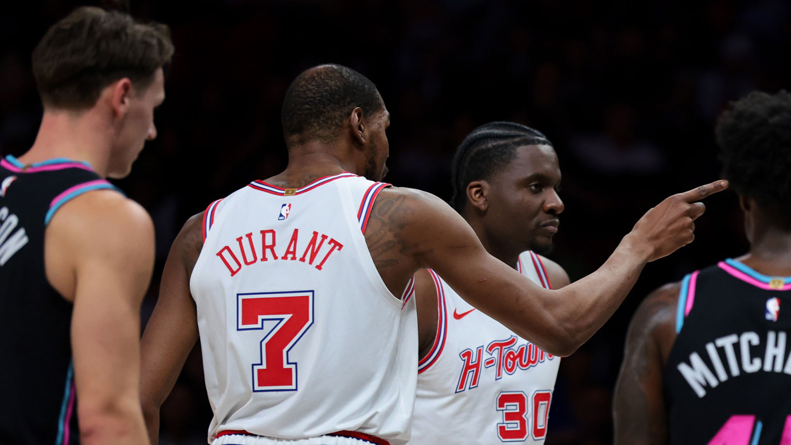 Houston Rockets forward Kevin Durant (7) argues with Miami Heat guard Tyler Herro (14) during the first quarter at Kaseya Center.