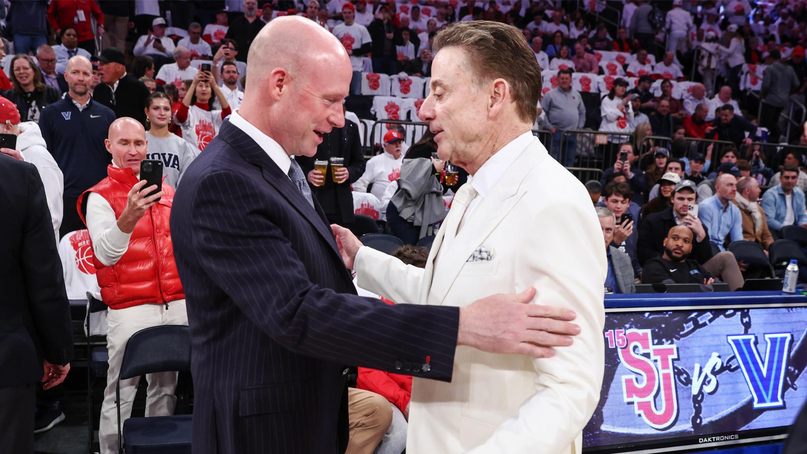 Villanova Wildcats head coach Kevin Willard greets St. John's Red Storm head coach Rick Pitino at Madison Square Garden.
