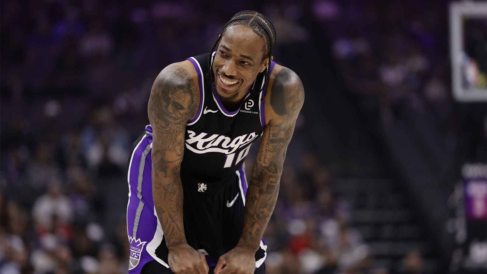 Kings forward/guard DeMar DeRozan (10) smiles between plays against the Charlotte Hornets during the first quarter at Golden 1 Center