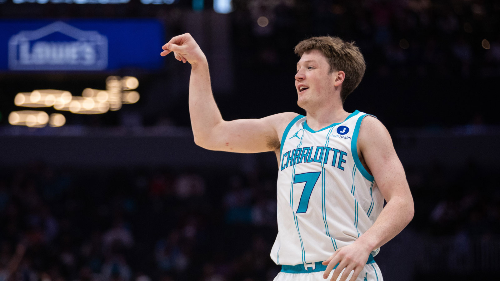 Charlotte Hornets guard Kon Knueppel (7) celebrates a three point basket against the Portland Trail Blazers during the first quarter at Spectrum Center.