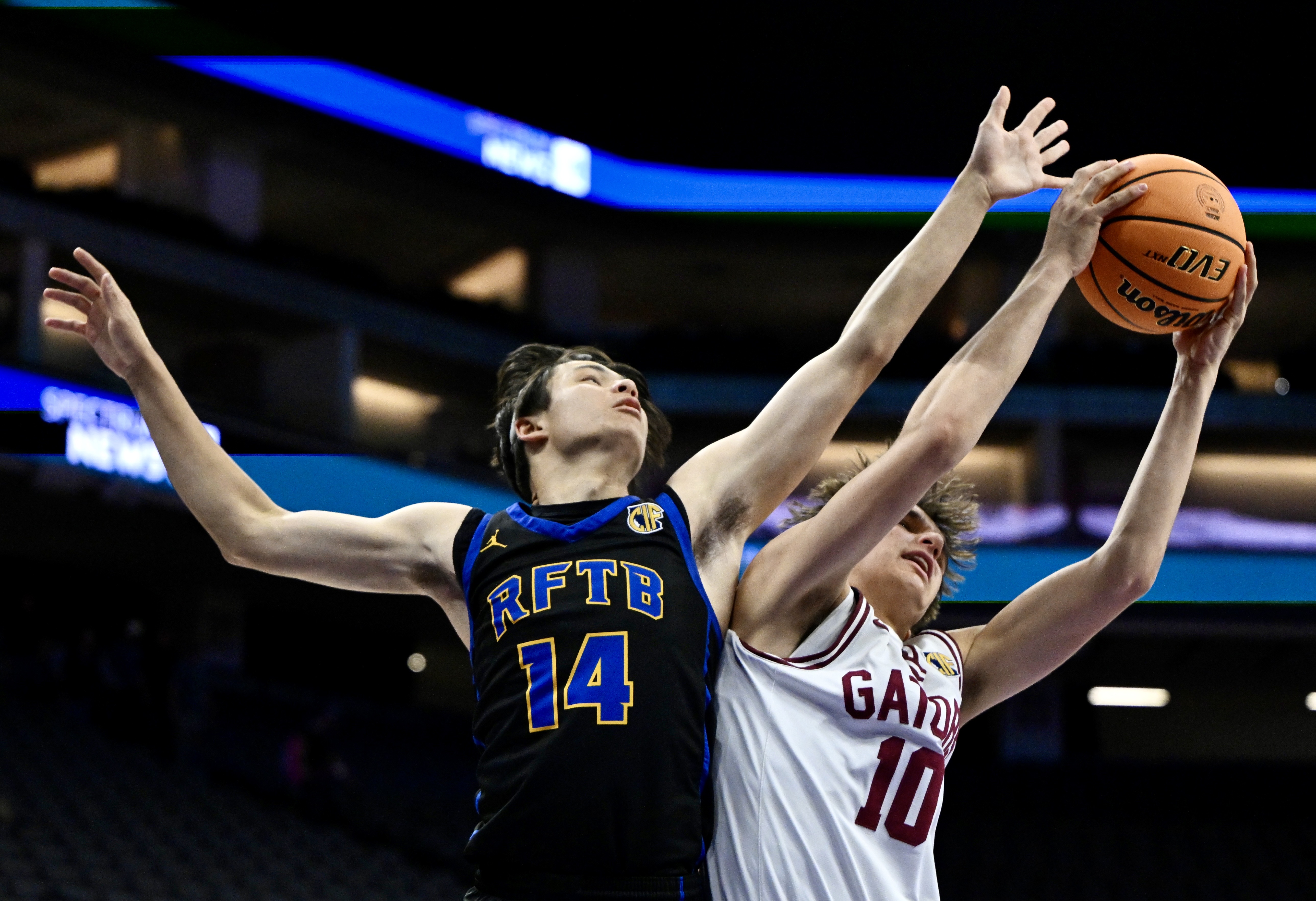 Cameron Goltara #14 of the San Juan Hills Stallions reaches...
