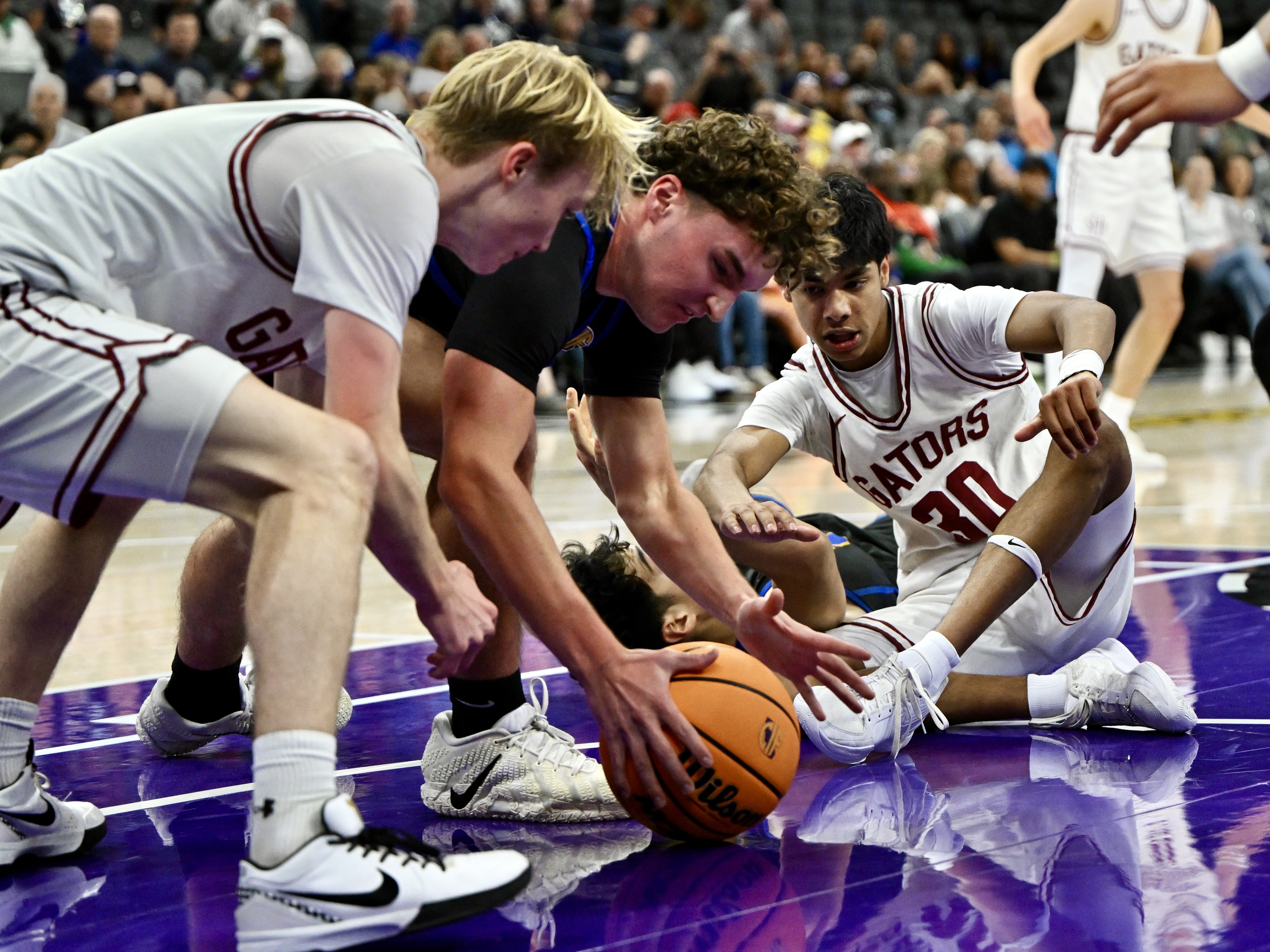 Parker Hull #32 of the San Juan Hills Stallions scrambles...