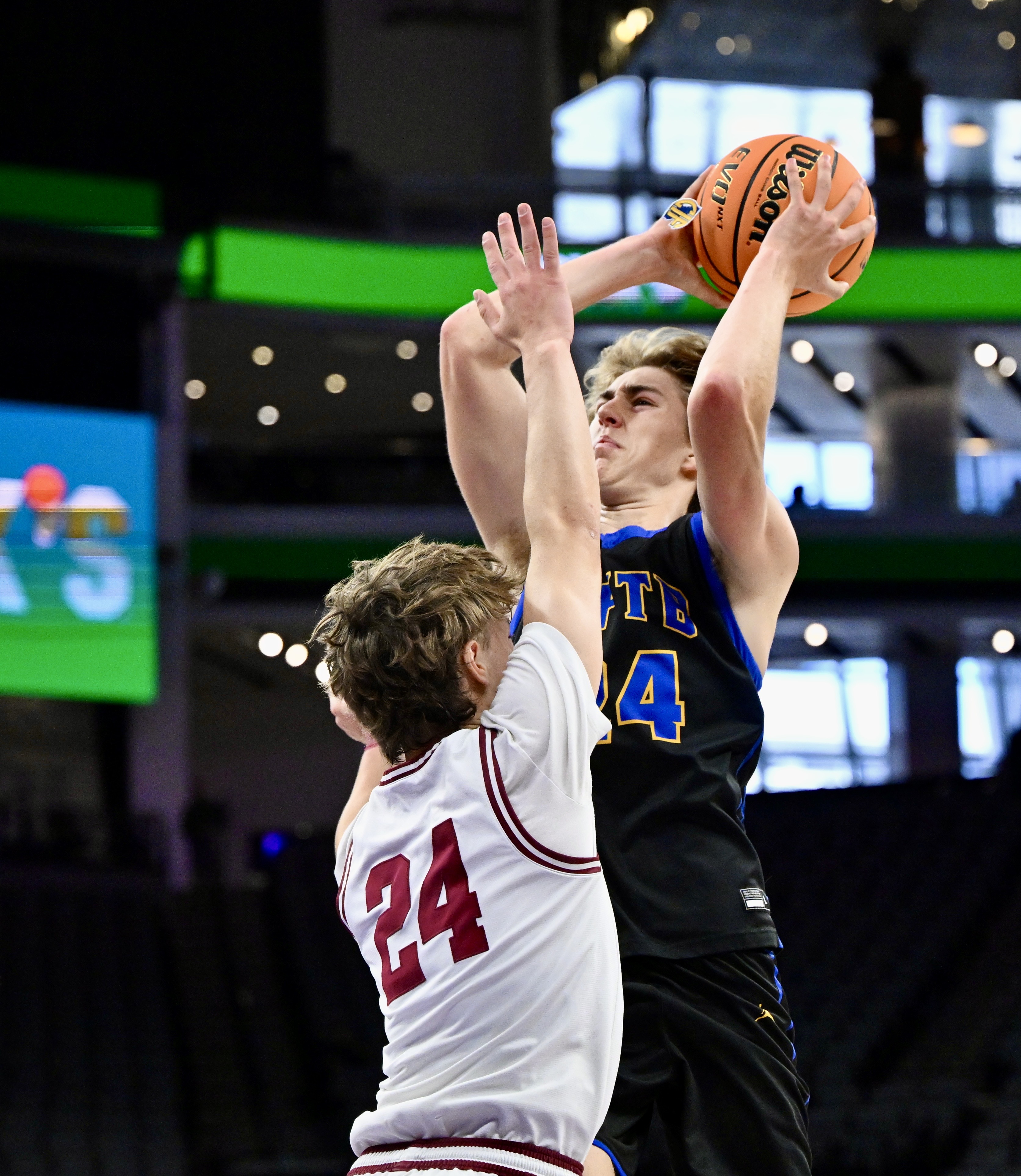 Rocco Jensen #24 of the San Juan Hills Stallions shoots...