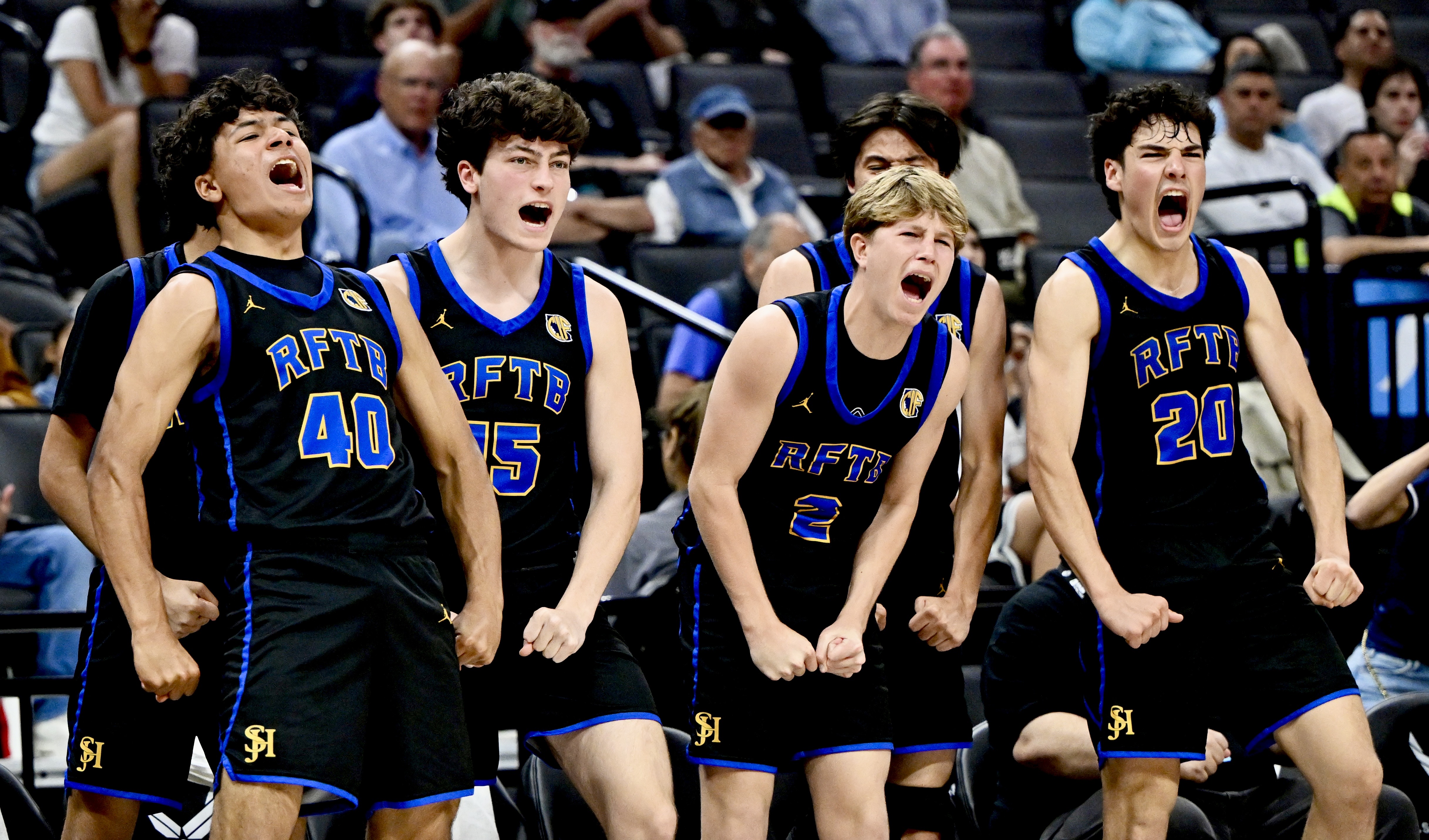 The San Juan Hills Stallions reacts after a basket against...