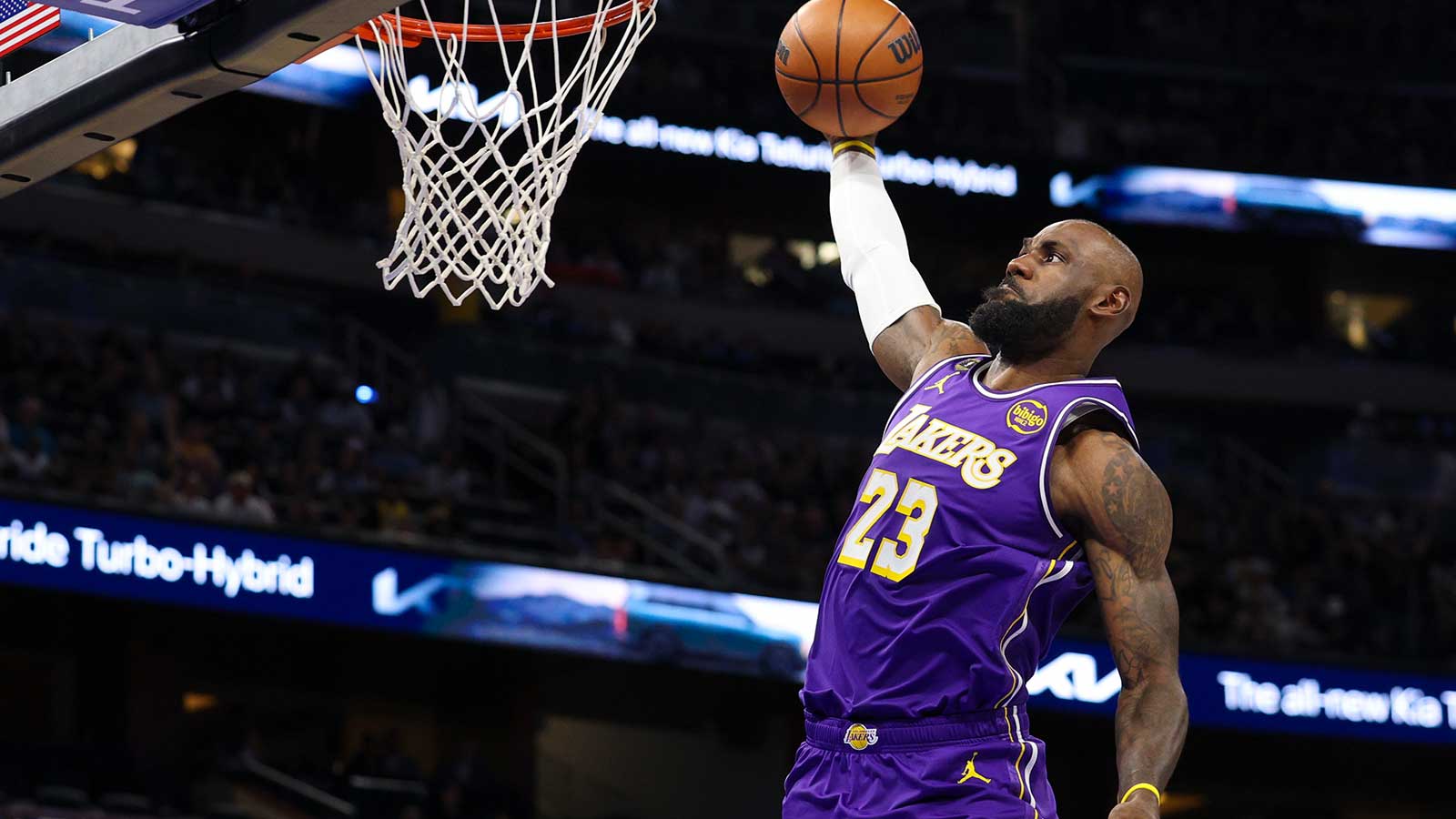  Los Angeles Lakers forward LeBron James (23) drives to the basket against the Orlando Magic in the first quarter at Kia Center. 