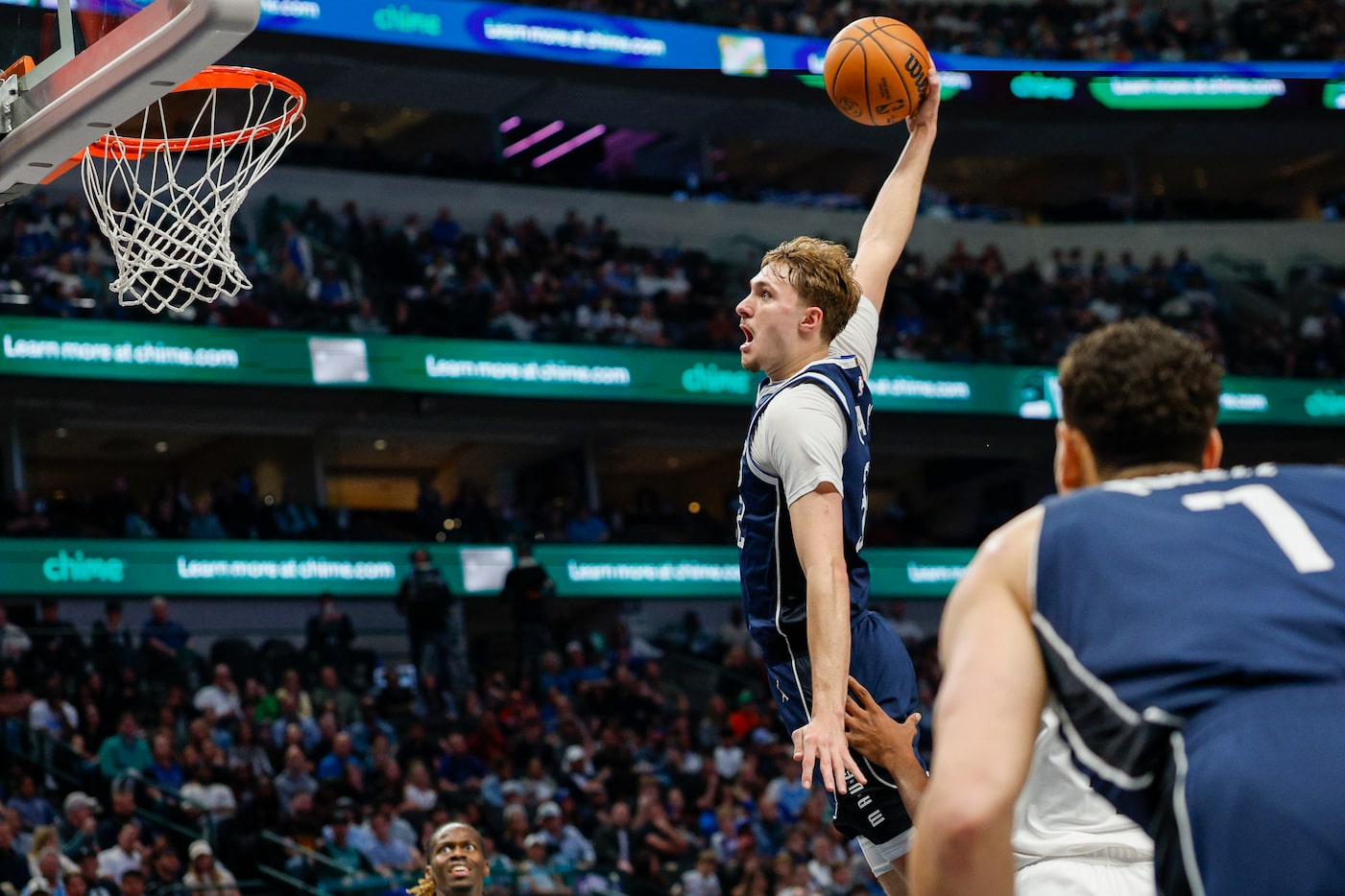 Dallas Mavericks forward Cooper Flagg (32) dunks the ball during the second half of an NBA...