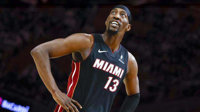 Miami Heat center/forward Bam Adebayo (13) looks up towards the fans during an NBA basketball game against the Milwaukee Bucks at Kaseya Center in Miami on March 12, 2026. 