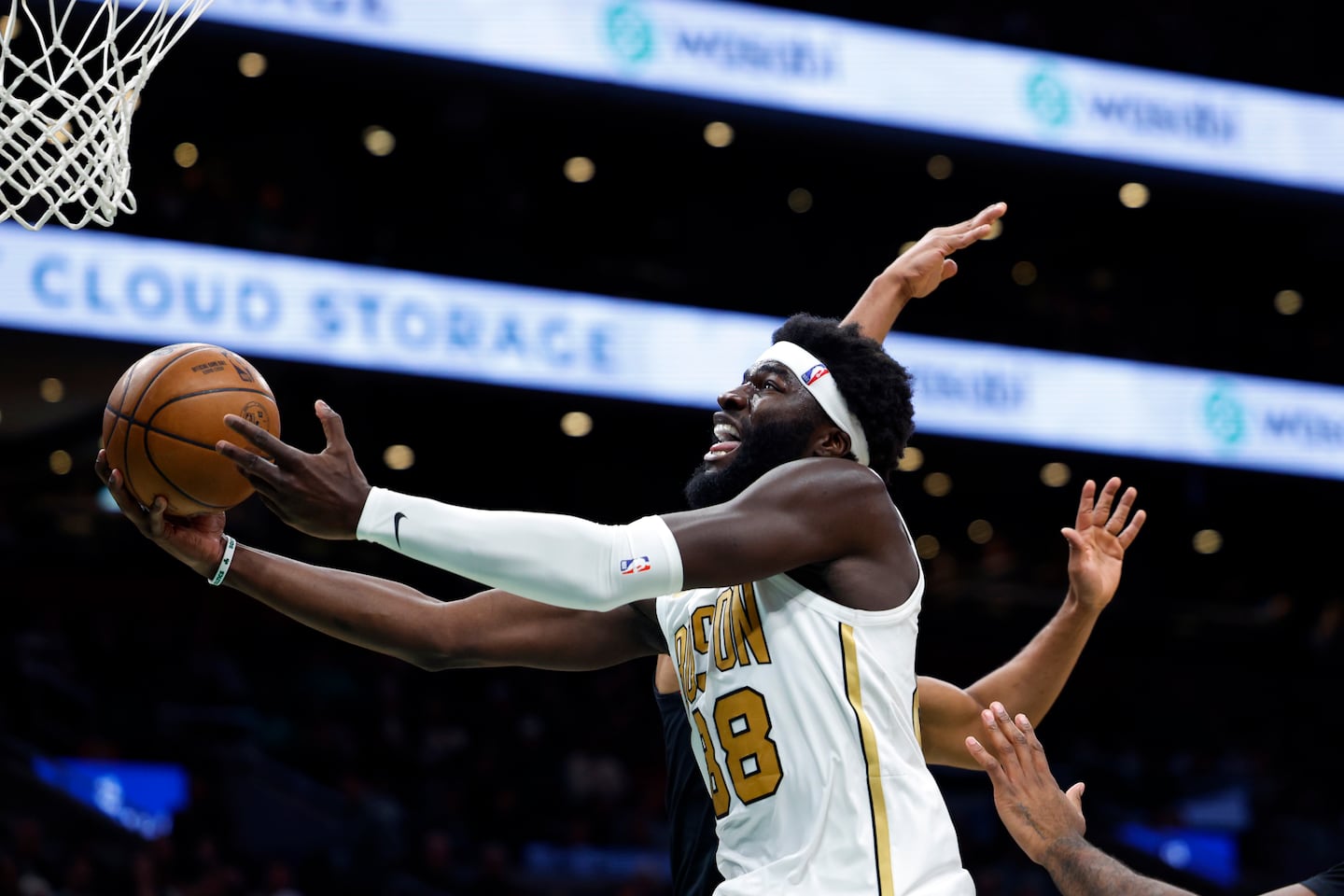 Celtics center Neemias Queta drove to the basket in the second quarter against the 76ers at TD Garden.