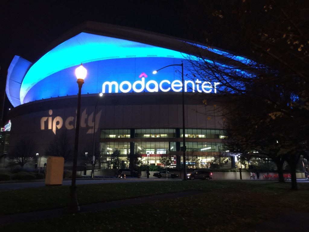 Nightime view of the Moda Center's exterior, which could take on a different look after the proposed $600 million remodel. Photo: Parker Knight  /  Wikimedia Commons, 2016.