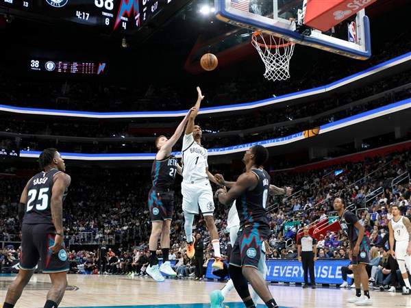 Nets end 10-game losing streak by rallying from down 23 points to stun Pistons 107-105