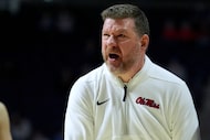 Mississippi head coach Chris Beard calls out to a official during the second half of an NCAA...