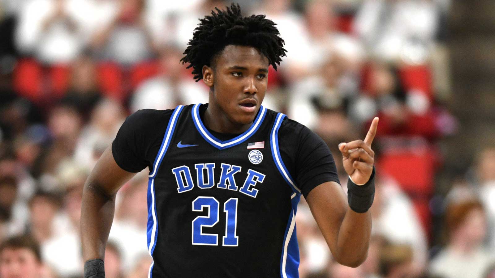 Duke Blue Devils center Patrick Ngongba II (21) reacts after scoring against the NC State Wolfpack during the first half at Lenovo Center.