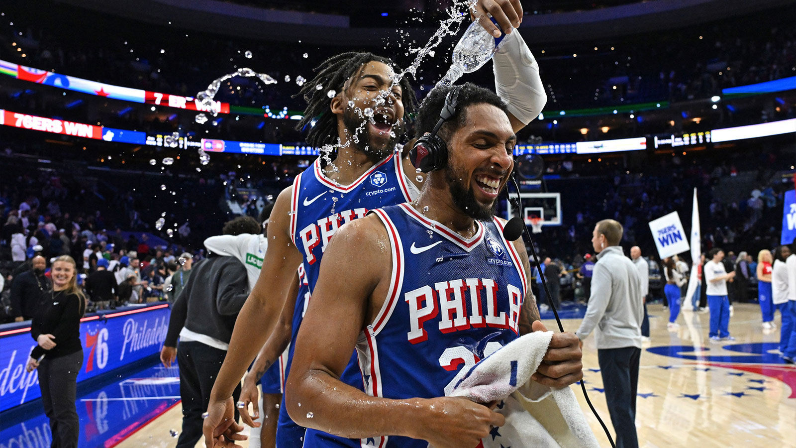Philadelphia 76ers guard Cameron Payne (20) has water poured on him by forward Trendon Watford (12) after win against the Memphis Grizzlies at Xfinity Mobile Arena.