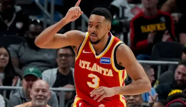 McCollum scores 30, Johnson has a triple-double as the Hawks beat the Bucks for 9th straight win