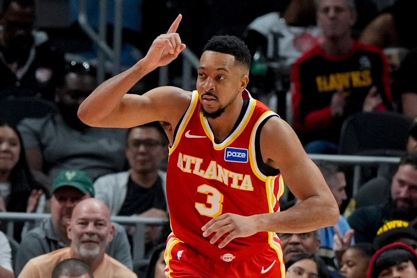 McCollum scores 30, Johnson has a triple-double as the Hawks beat the Bucks for 9th straight win