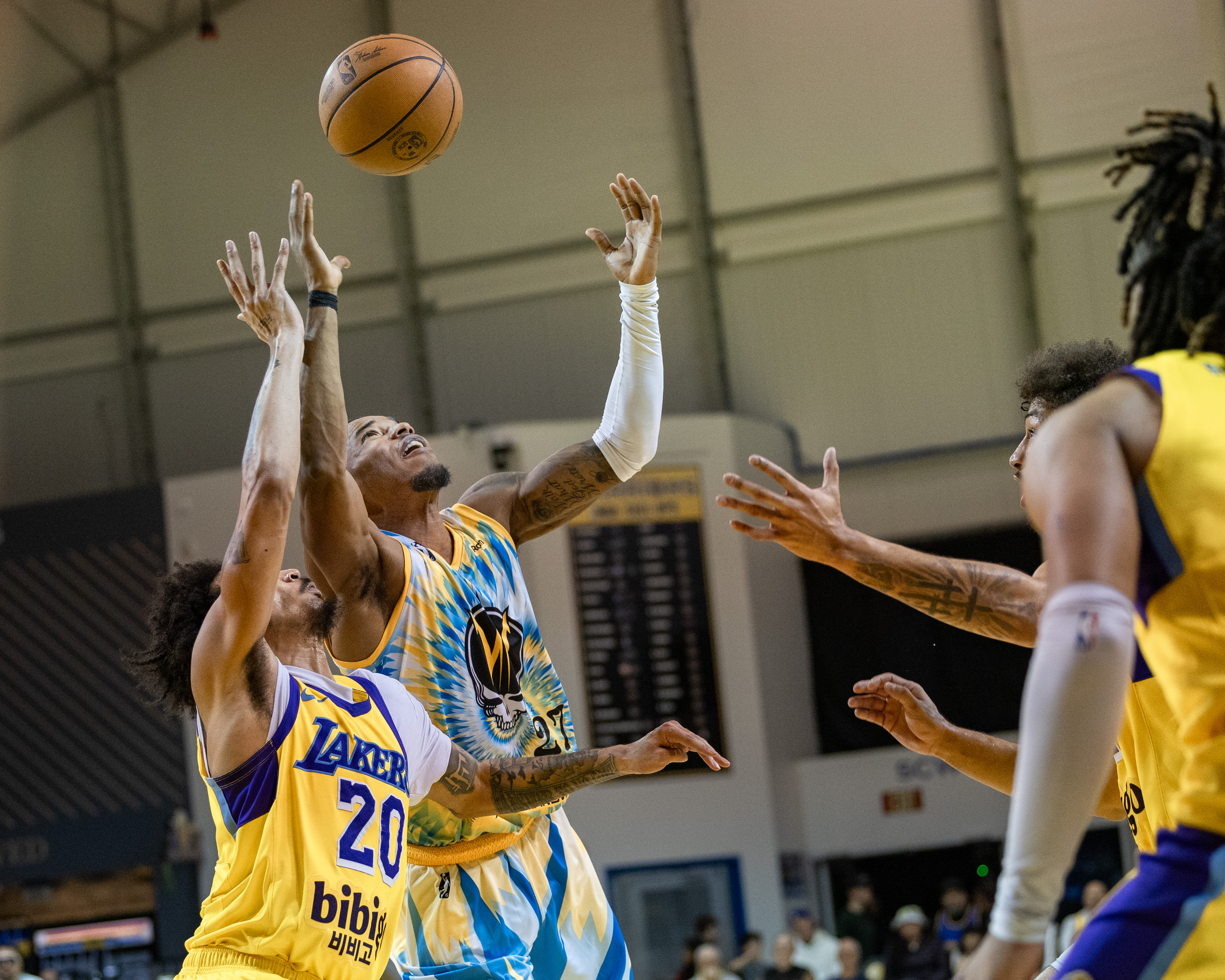 Santa Cruz Warriors guard Franco Miller competes for a rebound...