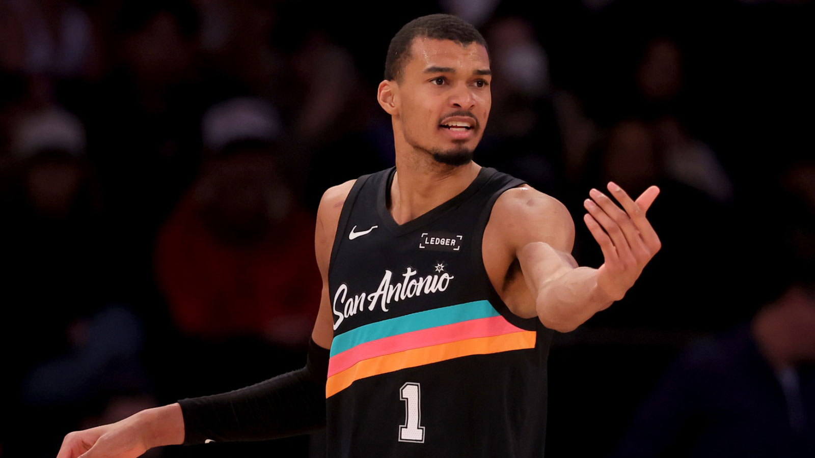 San Antonio Spurs forward Victor Wembanyama (1) gestures for the ball during the second quarter against the New York Knicks at Madison Square Garden. 