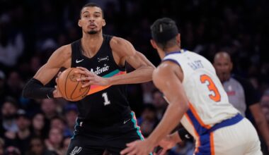San Antonio Spurs' Victor Wembanyama, left, looks to pass around New York Knicks' Josh Hart (3) during the second half of an NBA basketball game Sunday, March 1, 2026, in New York. (AP Photo/Seth Wenig)