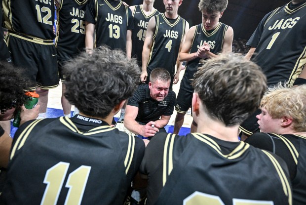 Head Coach Kent Grams of the Rock Canyon Jaguars speaks to his team during the second half of the Jaguars' 68-58 6A state championship basketball game win over the Ralston Valley Mustangs at the Denver Coliseum in Denver on Saturday, March 14, 2026. (Photo by AAron Ontiveroz/The Denver Post)
