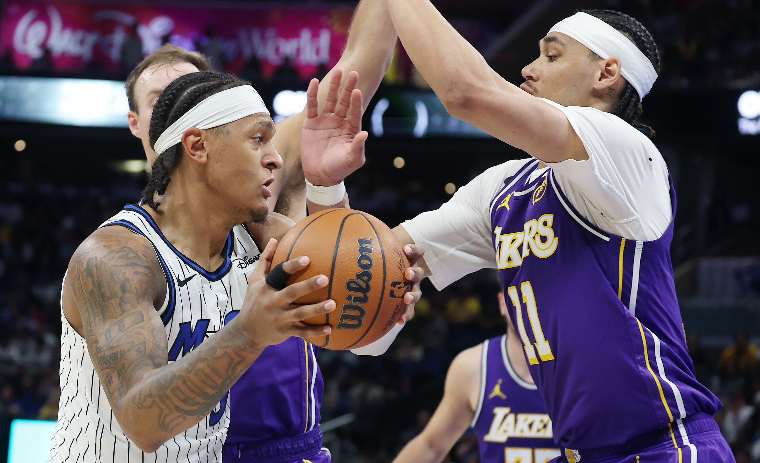 Orlando forward Paolo Banchero (5) tries to get past LA...