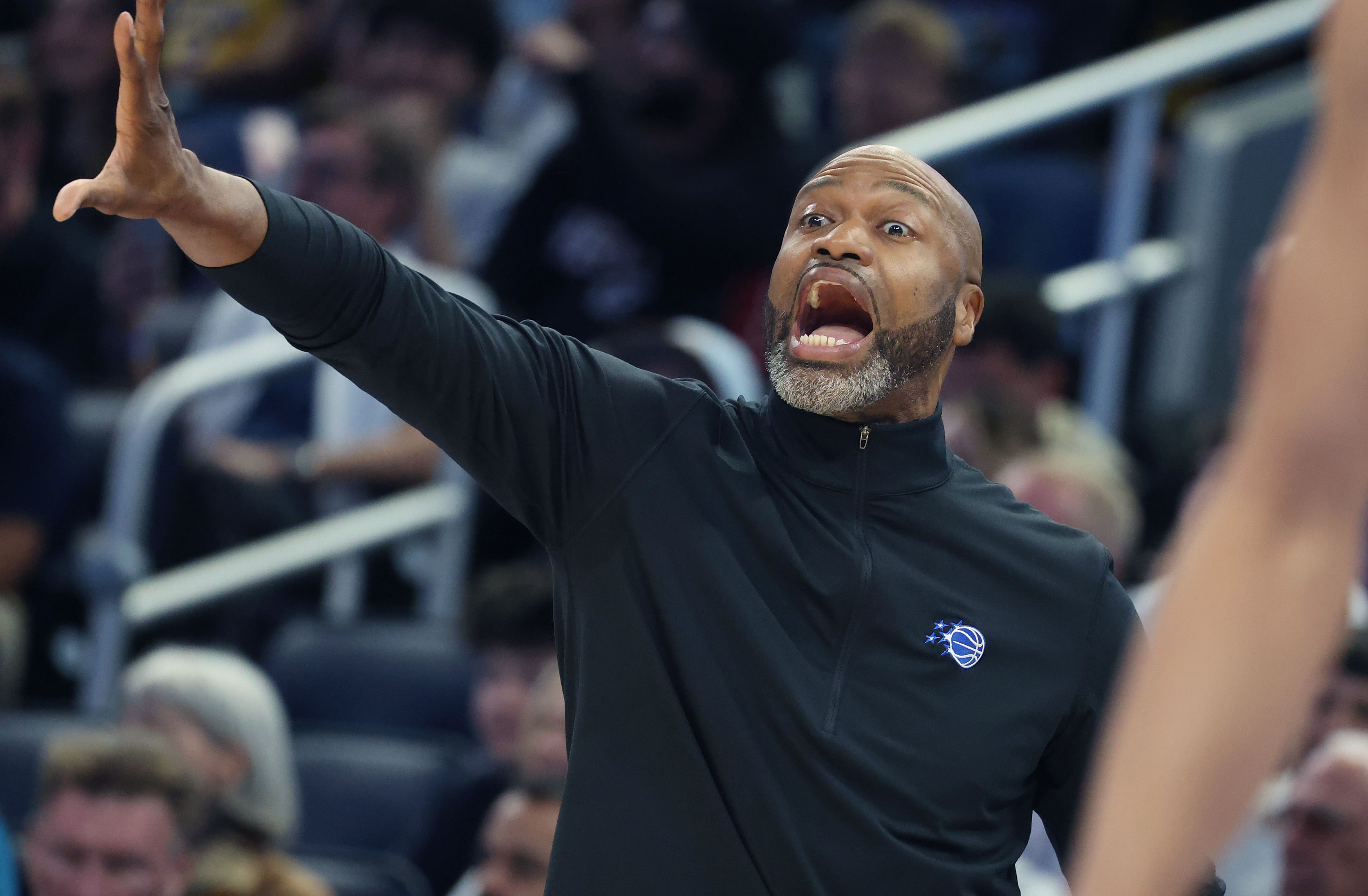 Orlando coach Jamahl Mosley yells during the Los Angeles Lakers...