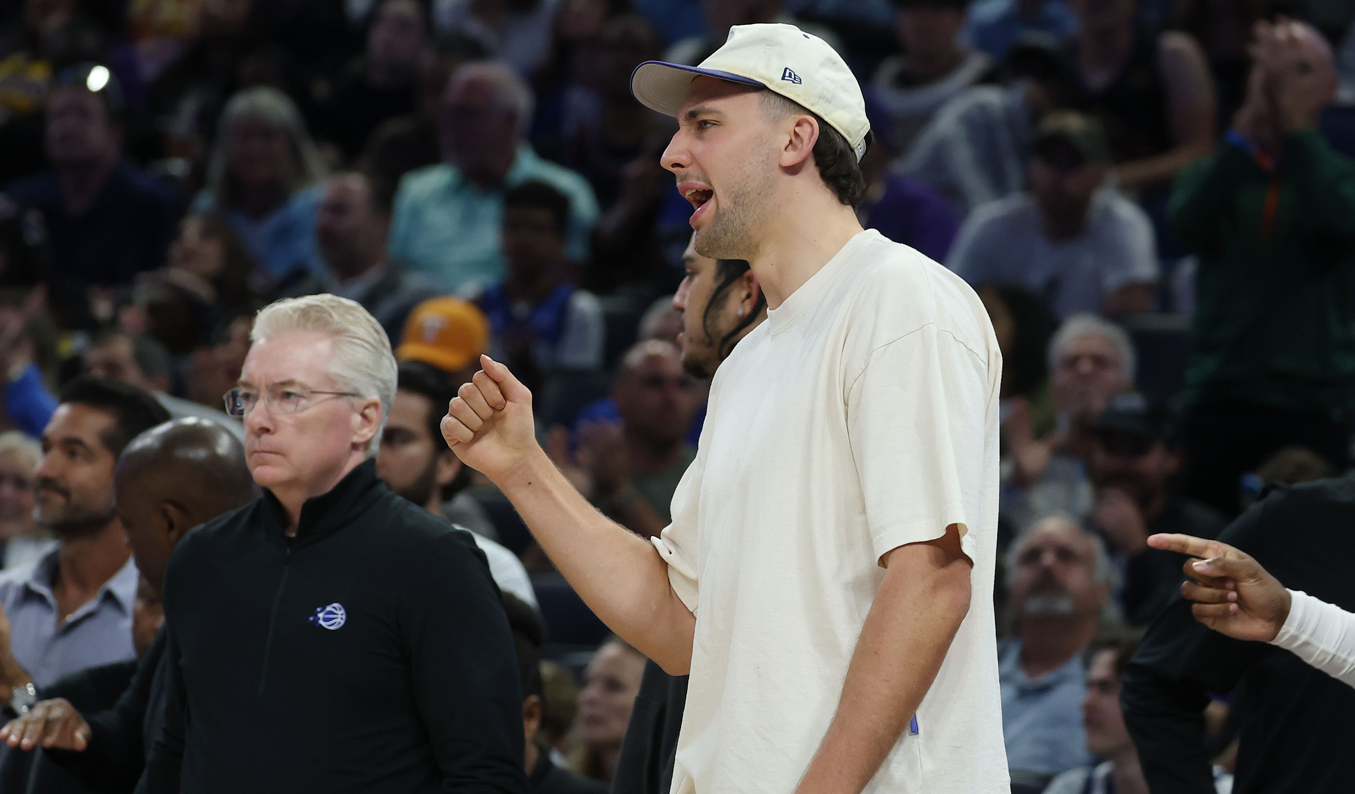 Orlando forward Franz Wagner cheers from the bench area during...