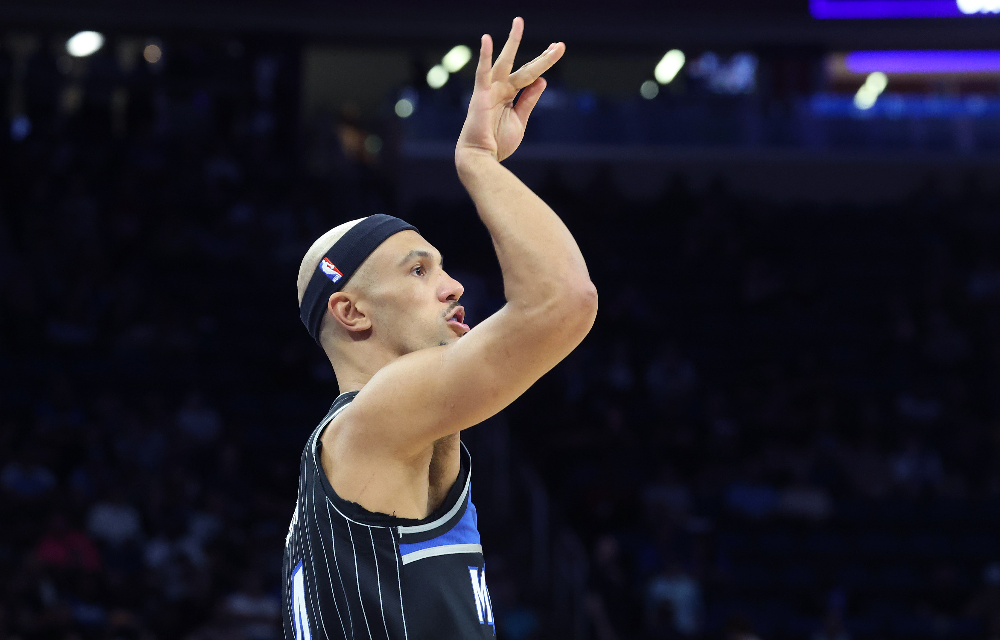 Orlando guard Jalen Suggs finishes a three point shot during...