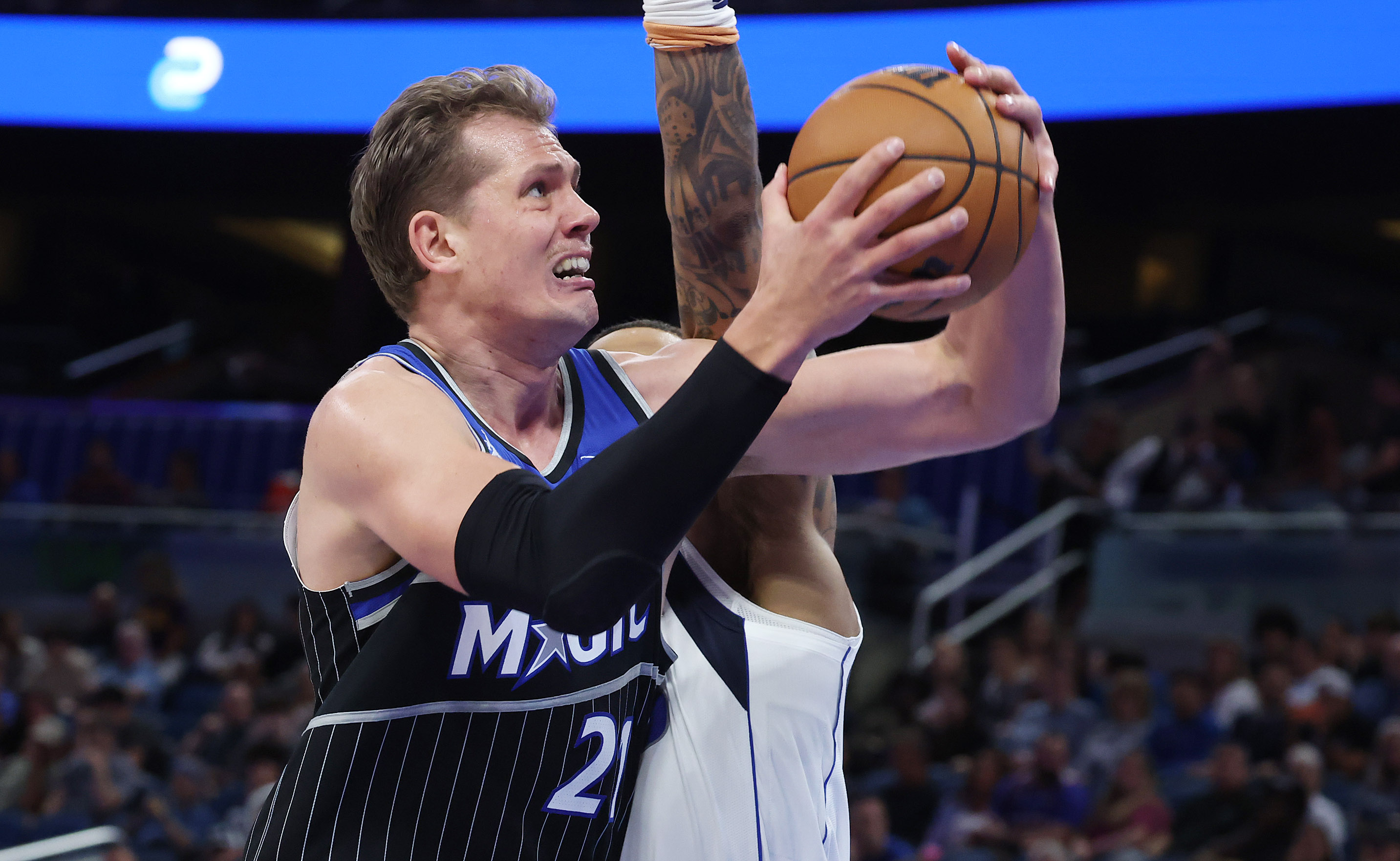 Orlando center Mo Wagner powers forward in the paint during...