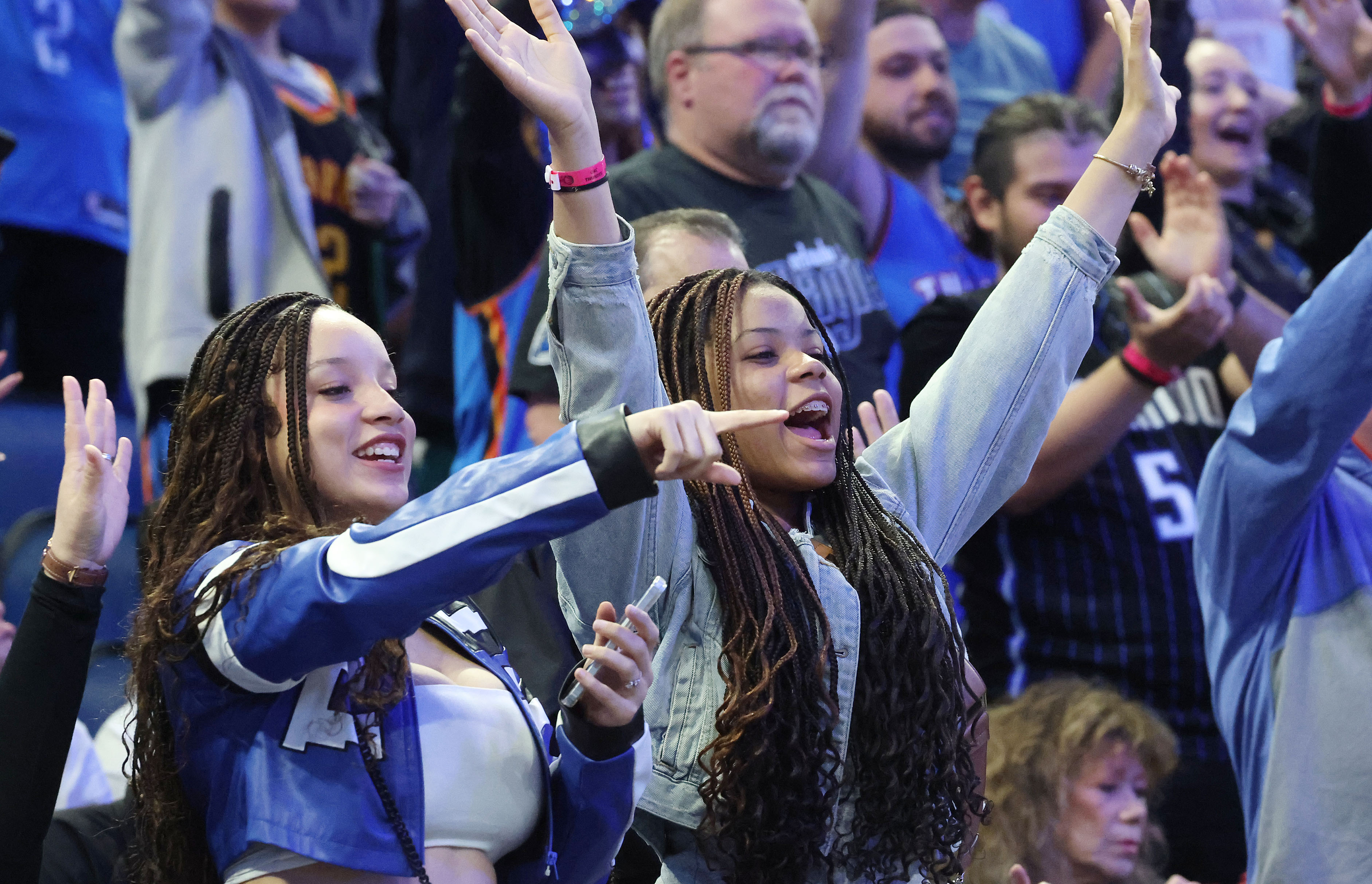 Fans cheer during the Oklahoma Thunder at Orlando Magic NBA...