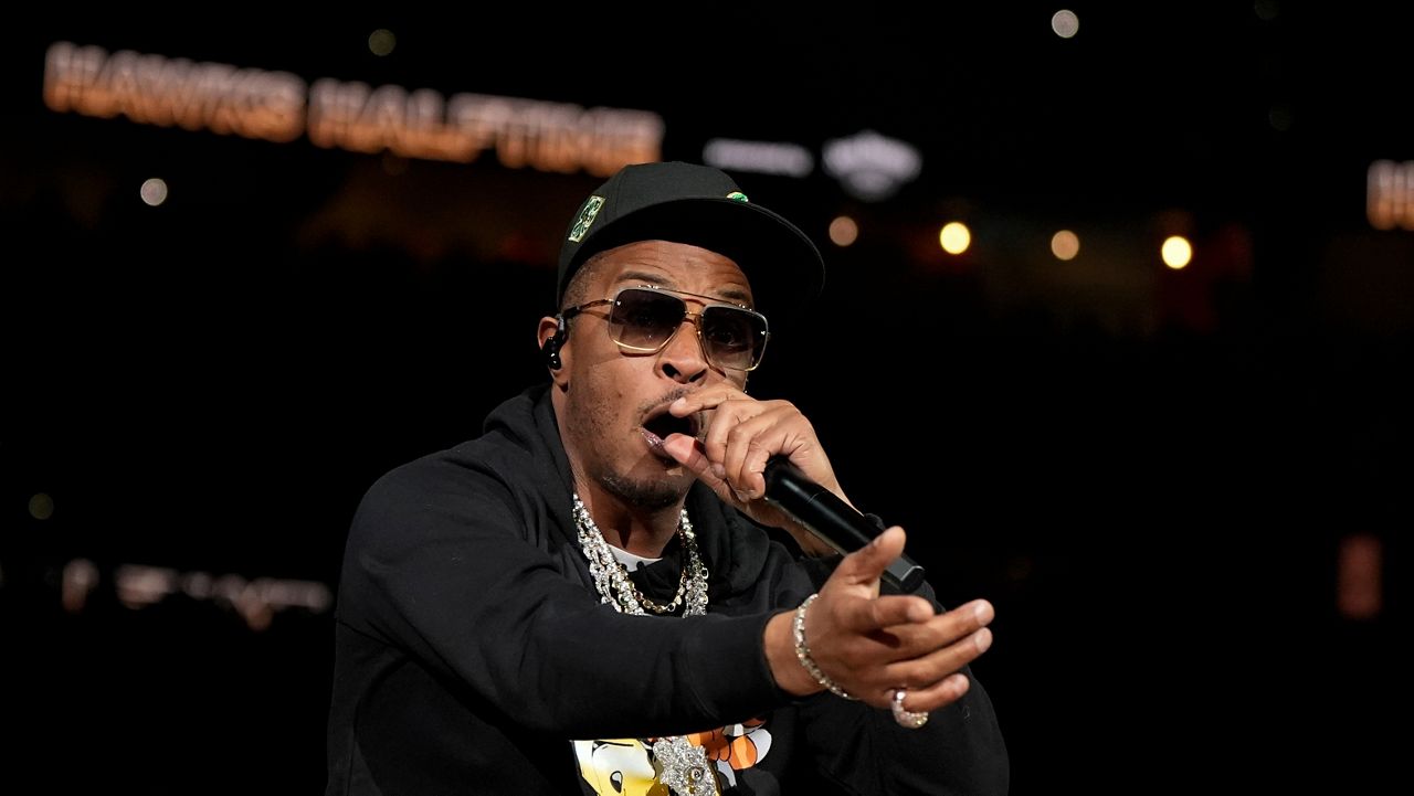 Rapper T.I performs at halftime of an NBA basketball game between the Atlanta Hawks and the Orlando Magic, Monday, March 16, 2026, in Atlanta. (AP Photo/Mike Stewart)