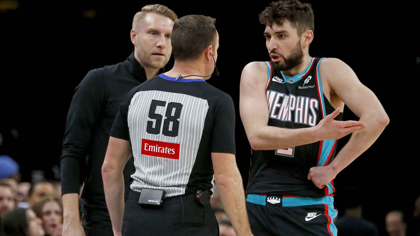 Jan 31, 2026; Memphis, Tennessee, USA; Memphis Grizzlies head coach Tuomas Iisalo and guard Ty Jerome (2) react toward an official during the third quarter against the Minnesota Timberwolves at FedExForum. Mandatory Credit: Petre Thomas-Imagn Images