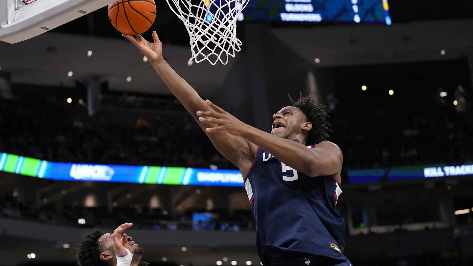 Connecticut Huskies center Tarris Reed Jr. (5) shoots during the first half against the Marquette Golden Eagles at Fiserv Forum.