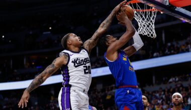 Mar 5, 2025; Denver, Colorado, USA; Sacramento Kings guard Markelle Fultz (20) blocks the shot attempt of Denver Nuggets forward Peyton Watson (8) in the first quarter at Ball Arena. Mandatory Credit: Isaiah J. Downing-Imagn Images