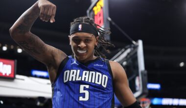 Apr 15, 2025; Orlando, Florida, USA; Orlando Magic forward Paolo Banchero (5) reacts after basket against the Atlanta Hawks in the fourth quarter at Kia Center. Mandatory Credit: Nathan Ray Seebeck-Imagn Images