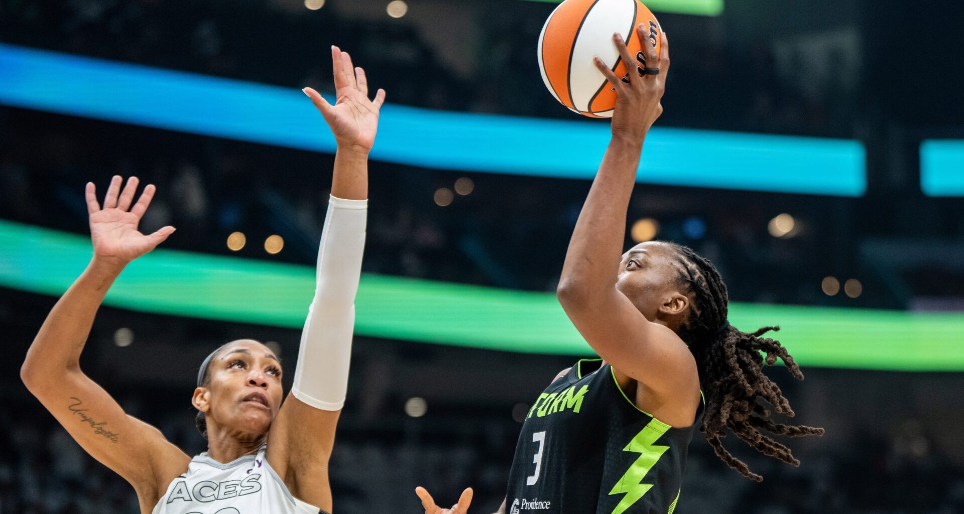 Sep 16, 2025; Seattle, Washington, USA; Seattle Storm forward Nneka Ogwumike (3) shoots the ball against Las Vegas Aces center A'ja Wilson (22) during the first half in game two of round one for the 2025 WNBA Playoffs at Climate Pledge Arena. Mandatory Credit: Stephen Brashear-Imagn Images