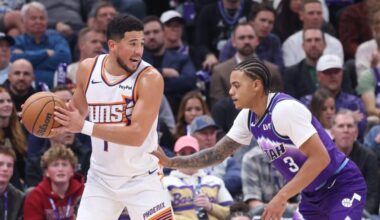 Oct 27, 2025; Salt Lake City, Utah, USA; Phoenix Suns guard Devin Booker (1) looks for the play against Utah Jazz guard Keyonte George (3) during the second half at Delta Center. Mandatory Credit: Rob Gray-Imagn Images