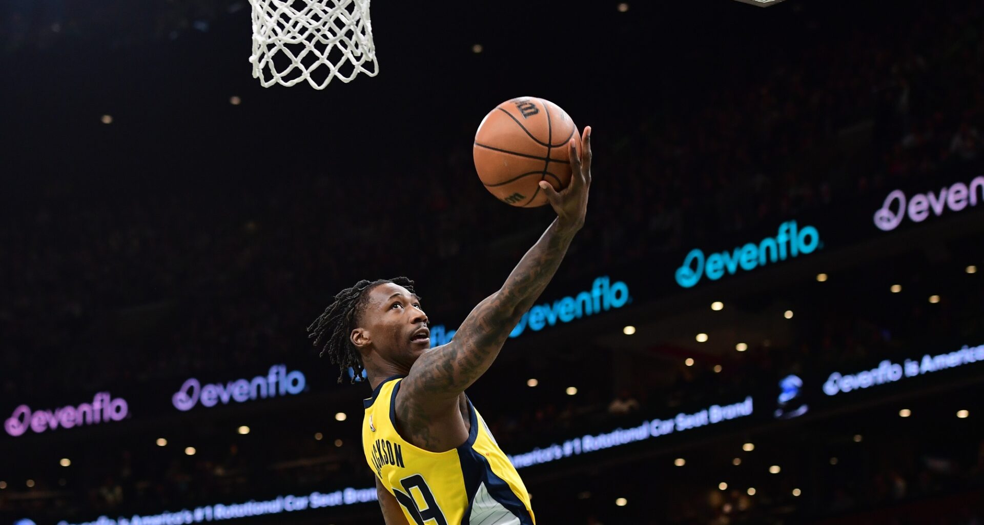 Indiana Pacers guard Quenton Jackson scores an acrobatic layup