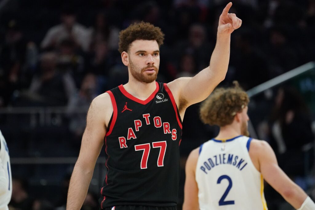  Toronto Raptors forward Jamison Battle (77) motions to a teammate during a game against the Golden State Warriors in the third quarter at Chase Center.