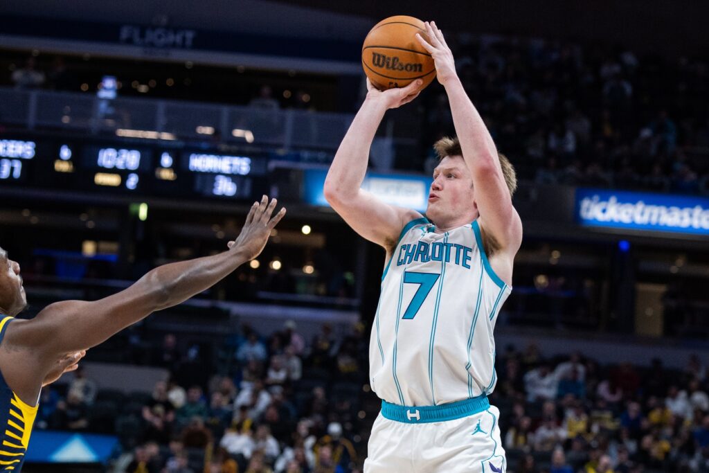 Feb 26, 2026; Indianapolis, Indiana, USA; Charlotte Hornets guard Kon Knueppel (7) shoots the ball in the first half against the Indiana Pacers at Gainbridge Fieldhouse. Mandatory Credit: Trevor Ruszkowski-Imagn Images