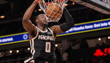 Feb 26, 2026; Atlanta, Georgia, USA; Atlanta Hawks forward Jonathan Kuminga (0) dunks against the Washington Wizards during the second half at State Farm Arena. Mandatory Credit: Dale Zanine-Imagn Images