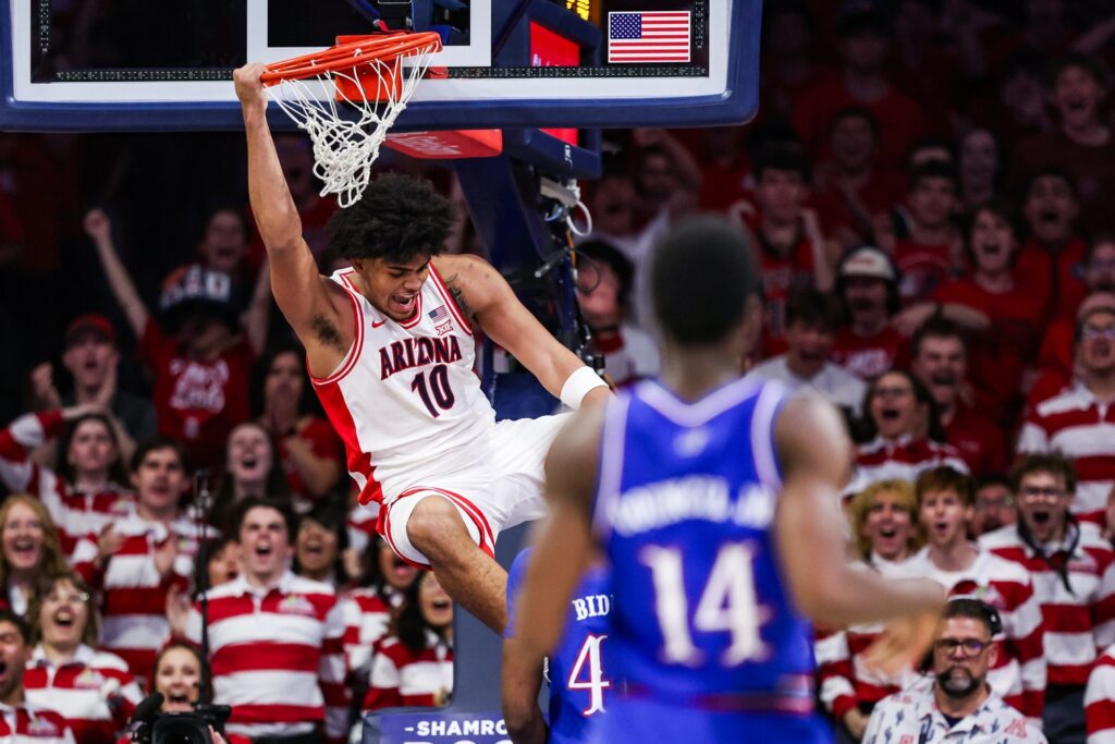 Arizona Wildcats forward Koa Peat (10) dunks the ball during the first half of the game against the Kansas Jayhawks at McKale Memorial Center.